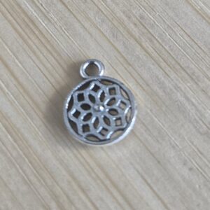 bedel ster ornament in circel zilver 10 mm