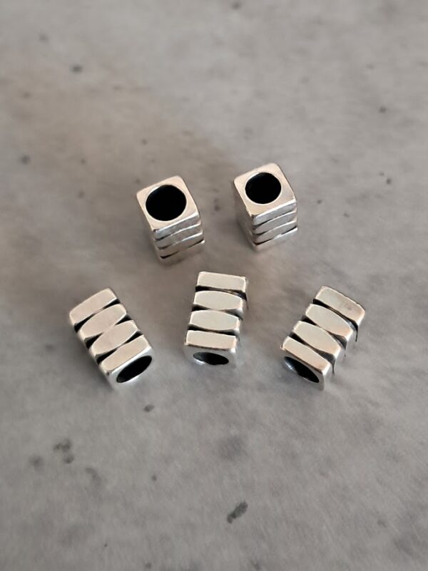 kraal 6 mm x 4 mm gat 2 mm zilver 5 stuks