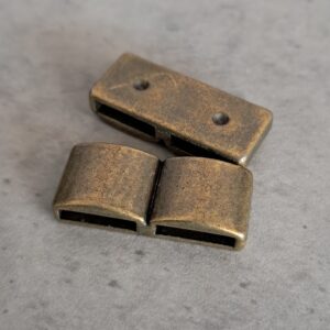 schuifkraal brons 2 gats  15 mm x 10 mm