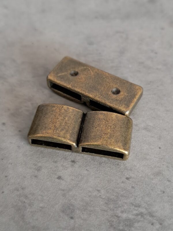 schuifkraal brons 2 gats  15 mm x 10 mm