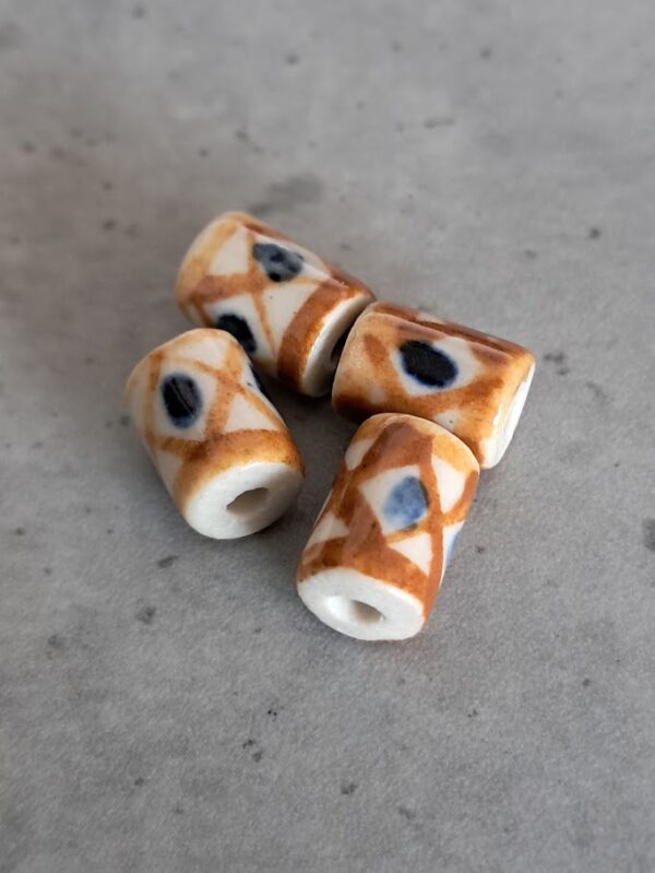 kraal keramiek tonnetje 10 mm x 6 mm 4 stuks
