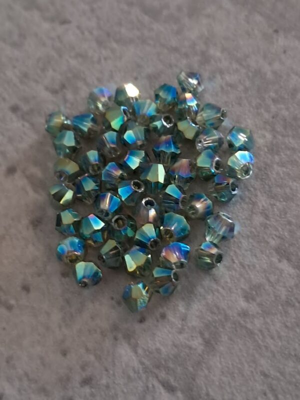 kraal bicone multicollor met turquoise 3 mm 50 stuks