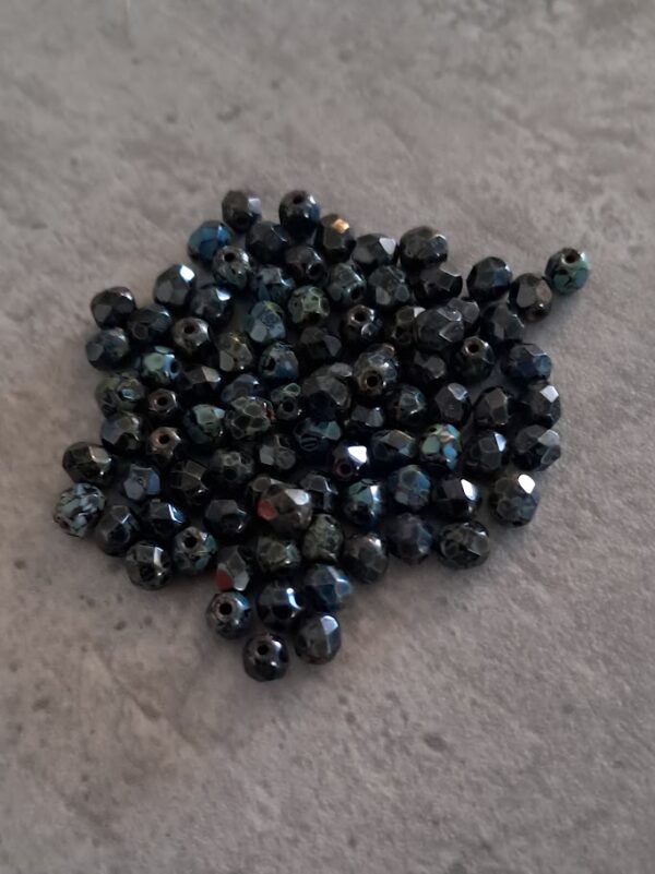 kraal facet rond hematite jet picasso 4 mm 100 stuks