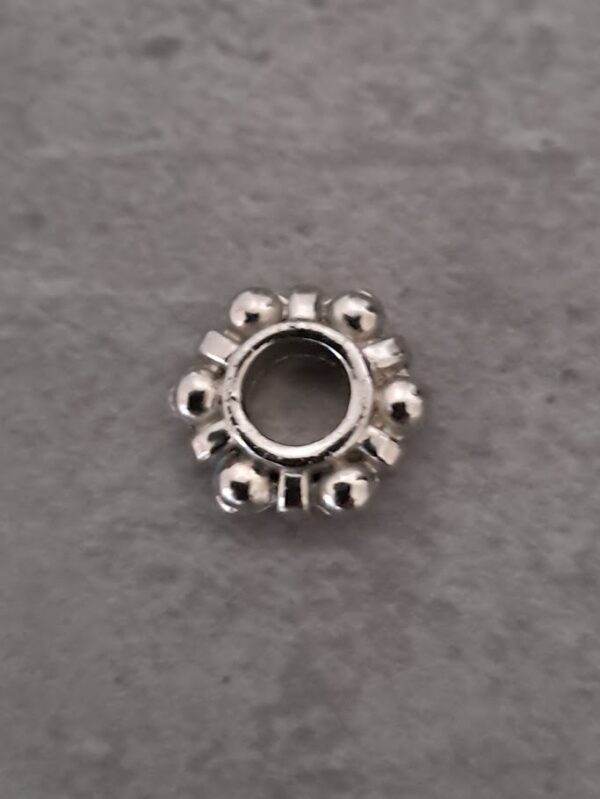 spacer zilver madelief 11 mm x 3 mm