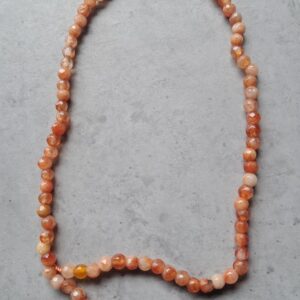 kraal  cameool facet geslepen oranje/bruin 5 mm streng 81 stuks