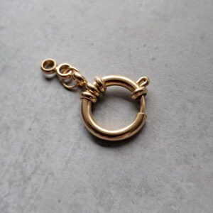 *boeislot met oogjes goud SS 16 mm